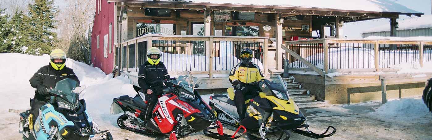 Snowmobilers outside of the Ironhorse